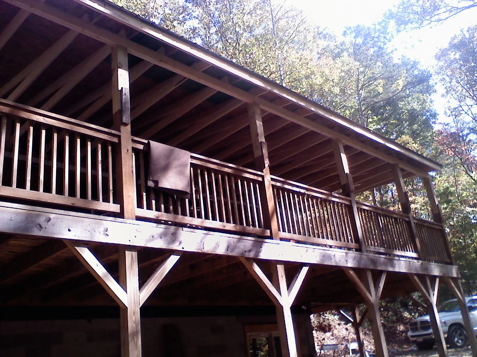Timber framing under a new elevated porch and deck — Roof Leak Repair in Mondamin by Roofing Brothers